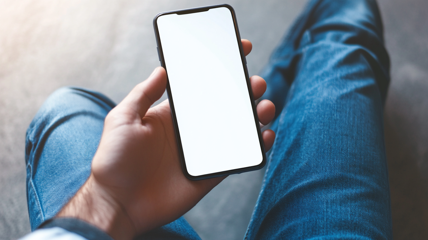 Close-up of Hand Holding Smartphone