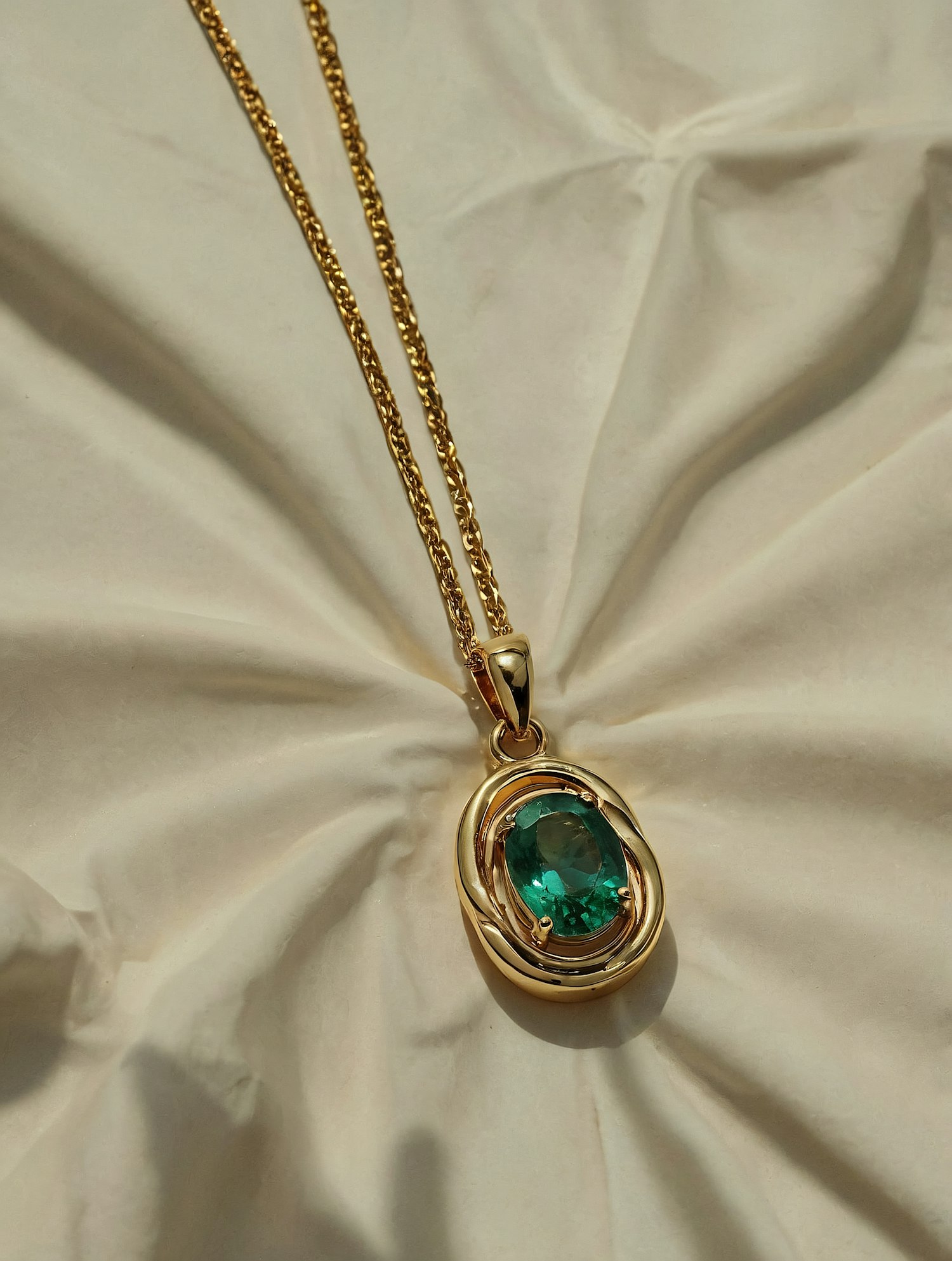 Gold Necklace with Emerald Pendant