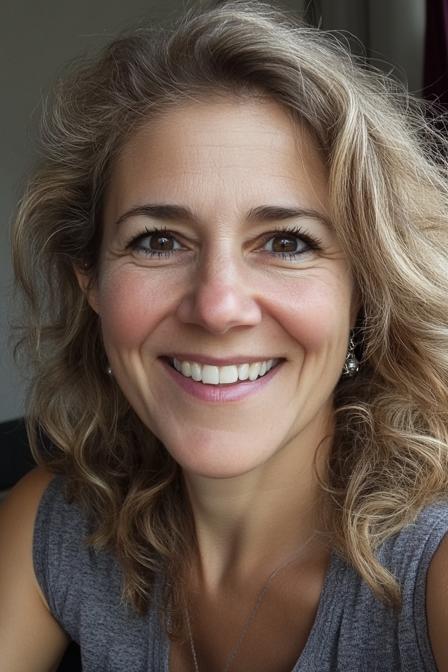 Smiling Woman with Curly Hair