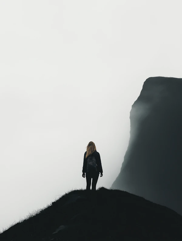 Solitary Figure on Misty Hill
