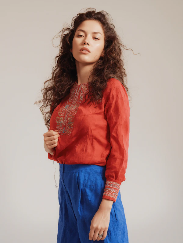Woman in Embroidered Blouse