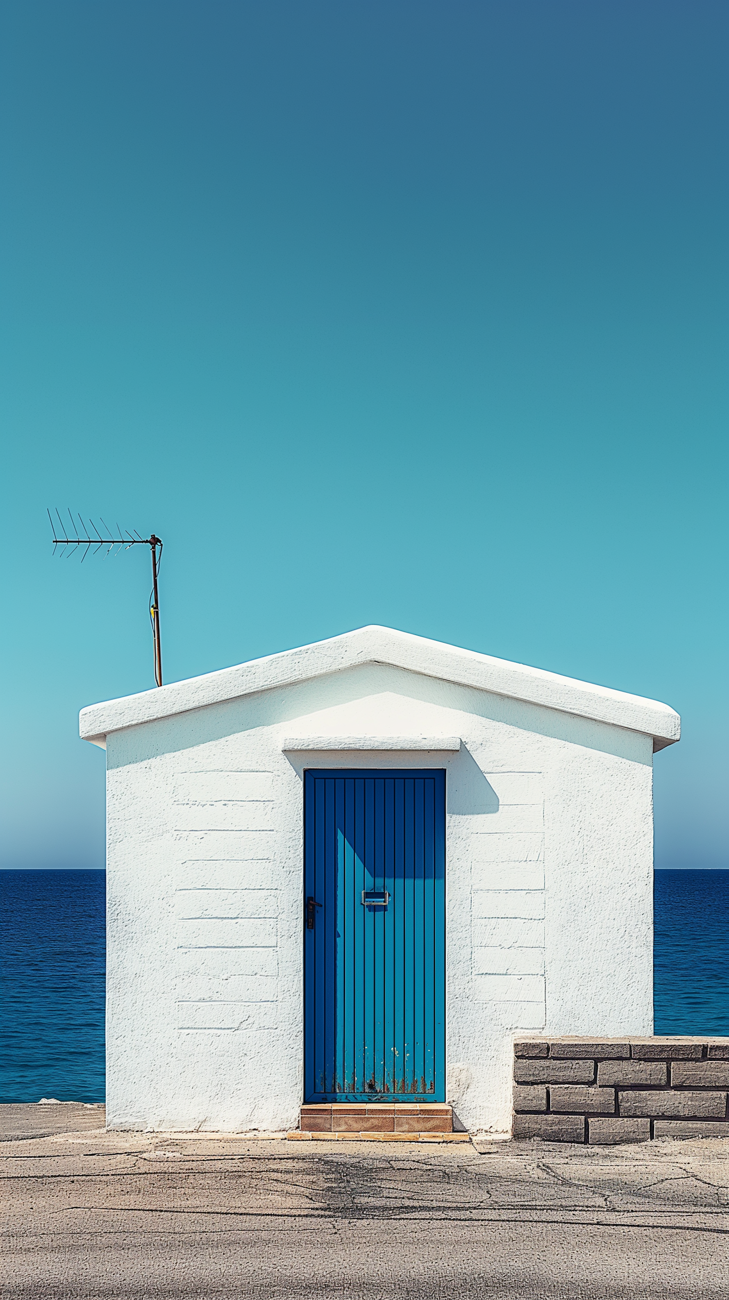 Coastal White Building with Blue Door