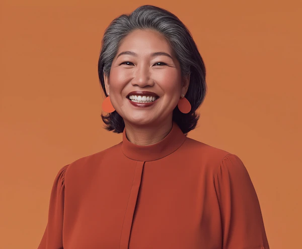 Smiling Woman in Orange Blouse