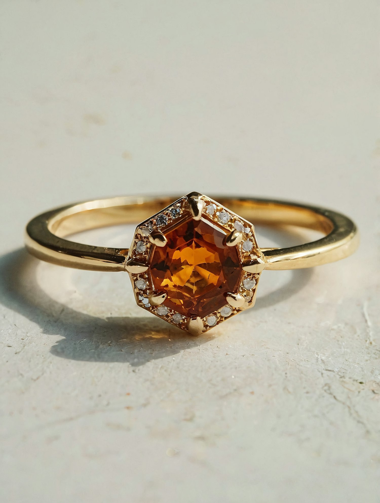 Elegant Gold Ring with Orange Gemstone