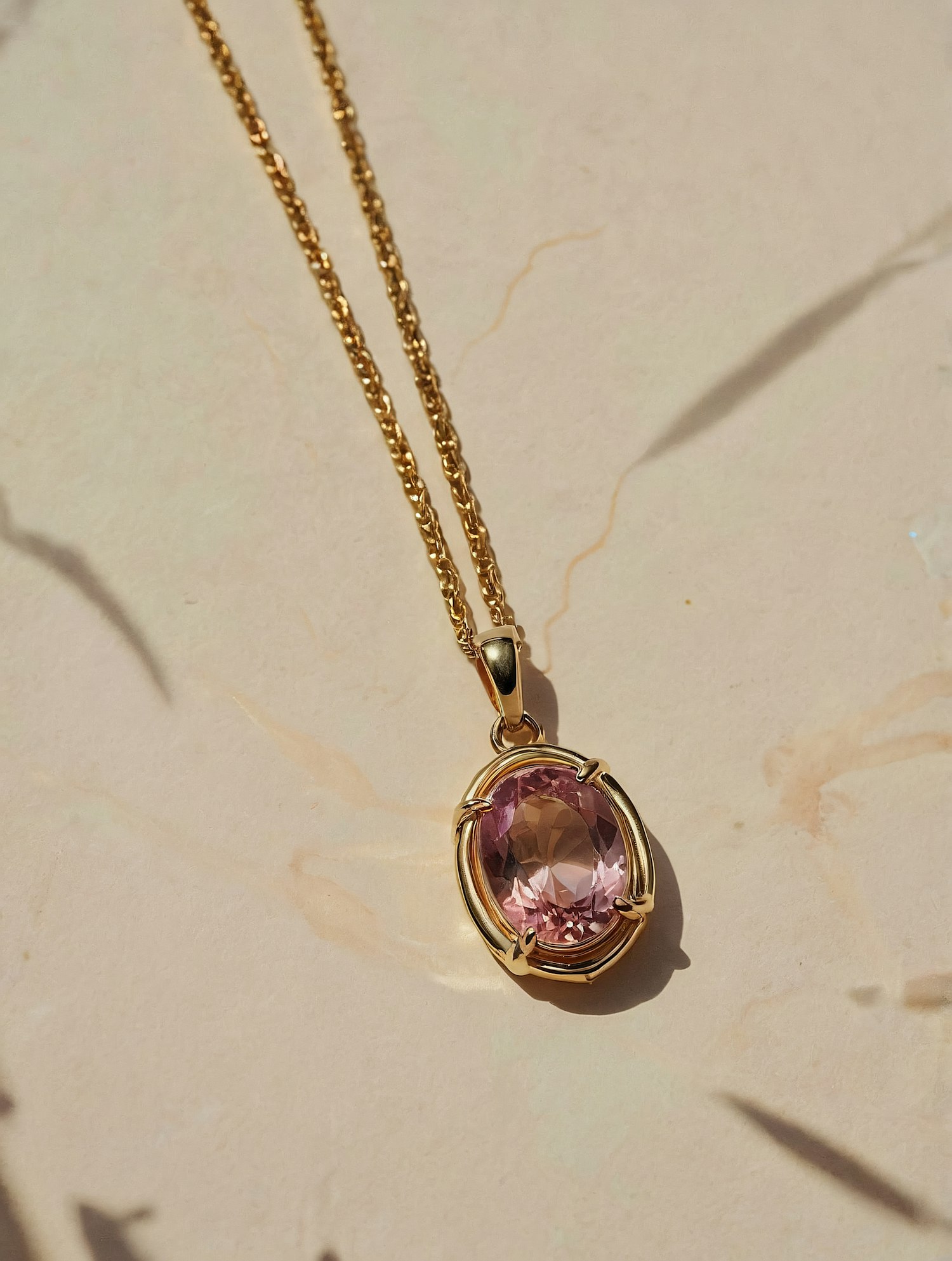 Elegant Gold Necklace with Pink Gemstone