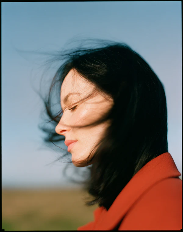 Woman in Red Coat
