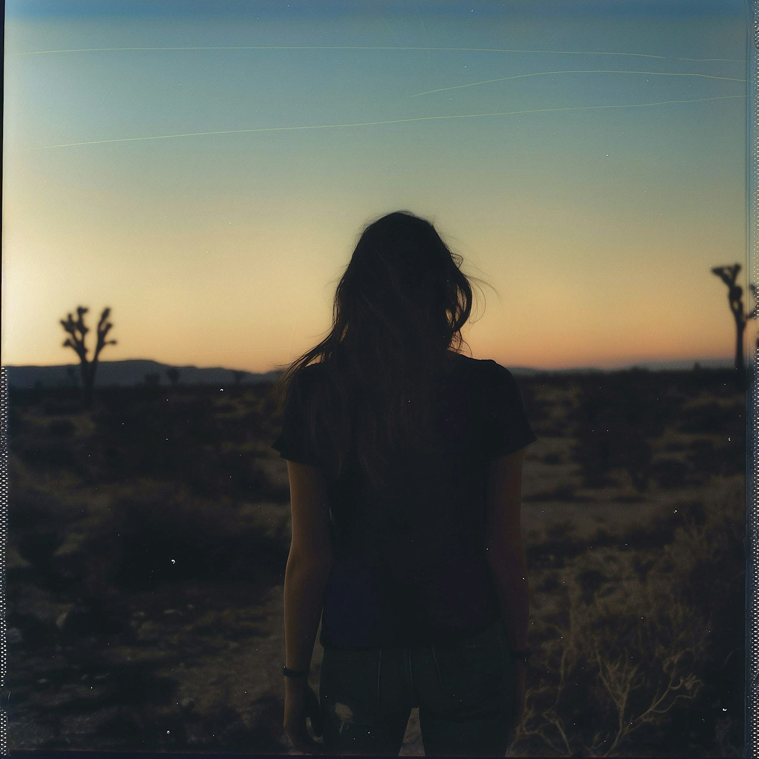 Solitary Woman in Desert at Dusk