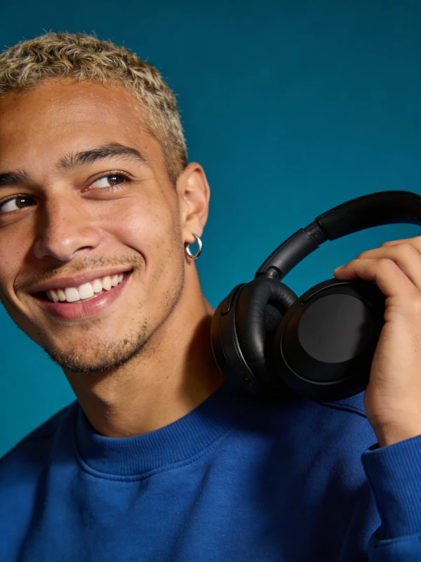 Smiling Man with Headphones