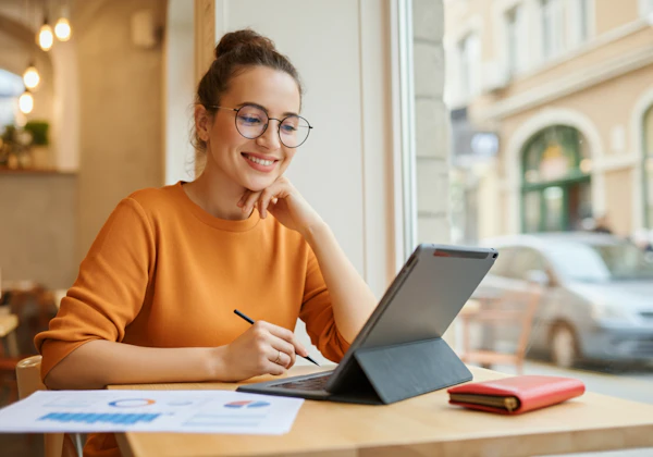 Woman Engaged with Tablet