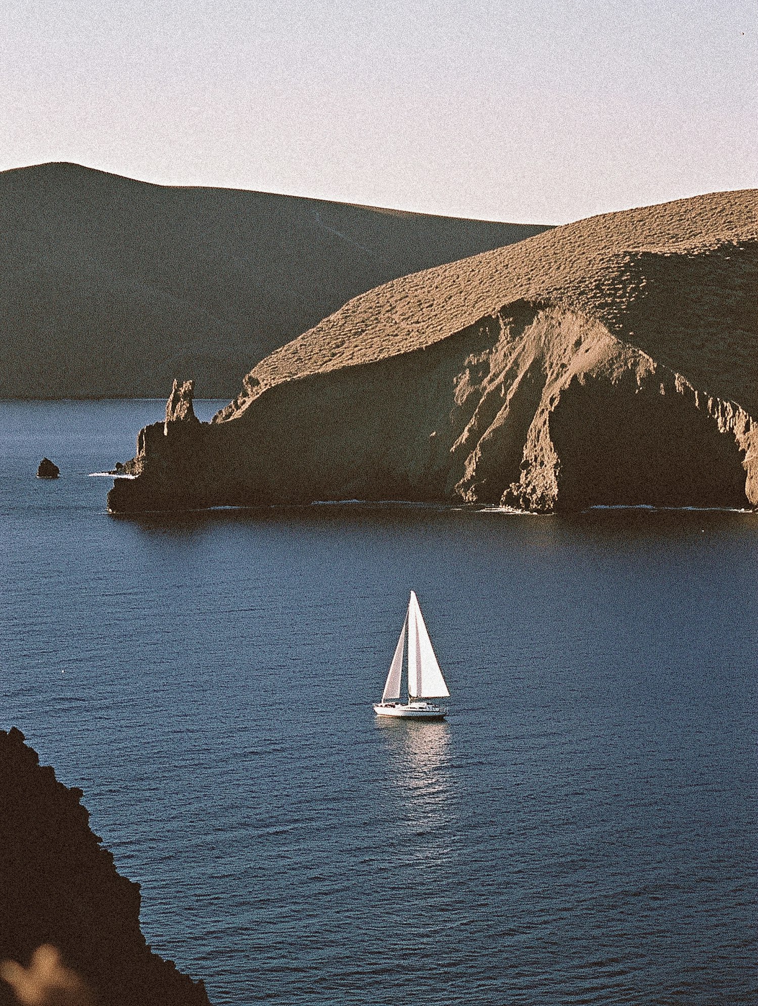 Serene Seascape with Sailboat