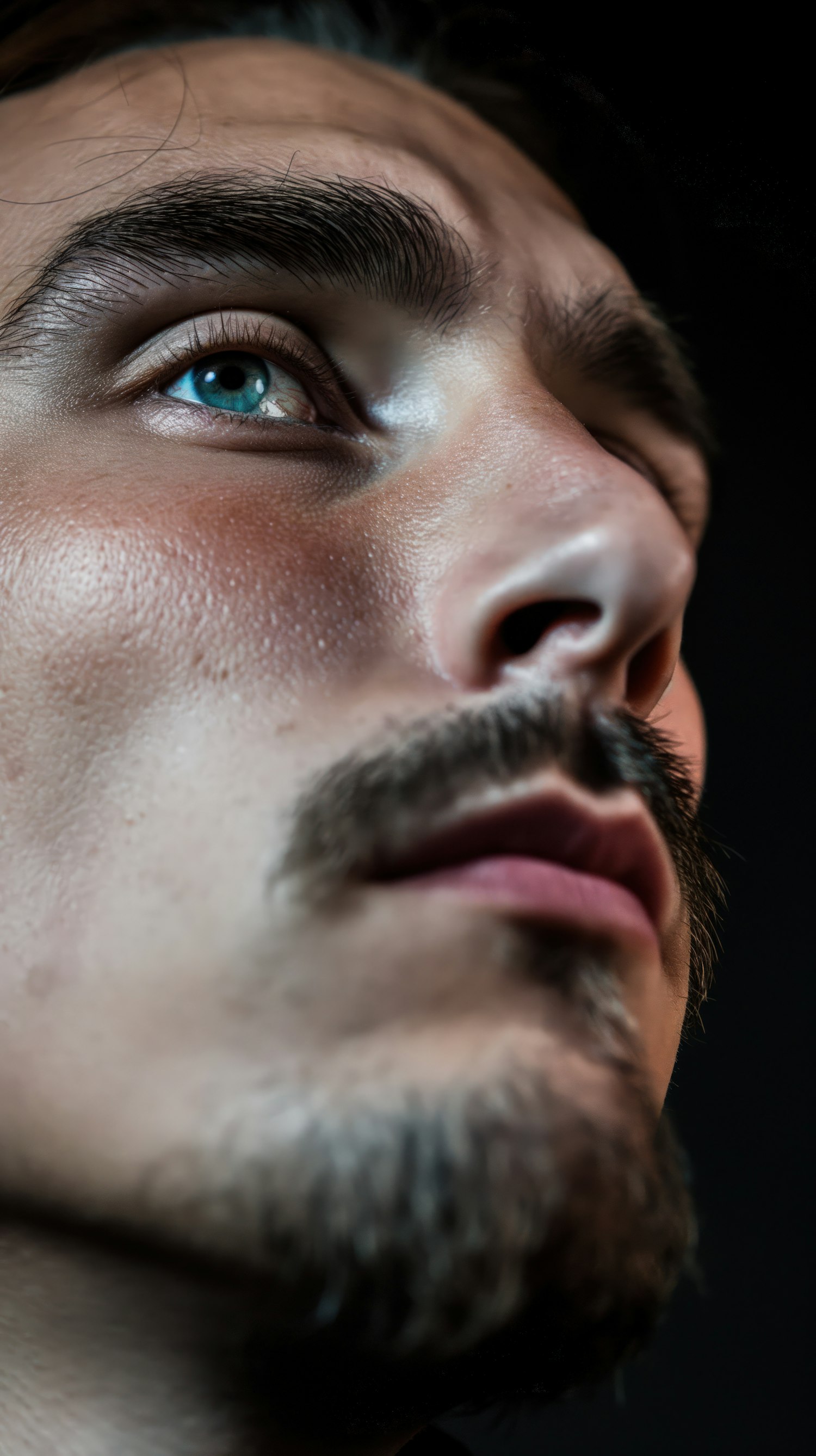 Close-Up Portrait of a Contemplative Young Man