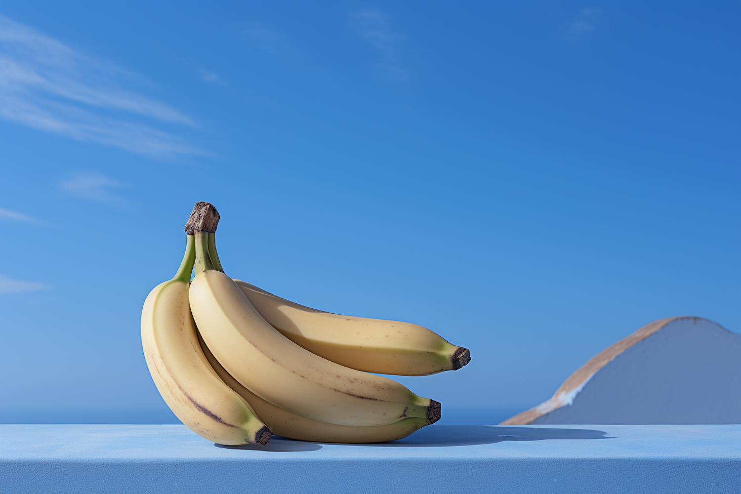 Fresh Bananas on a Blue Tabletop