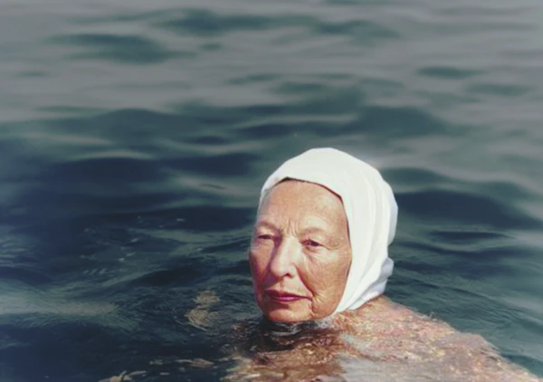 Elderly Woman in Water