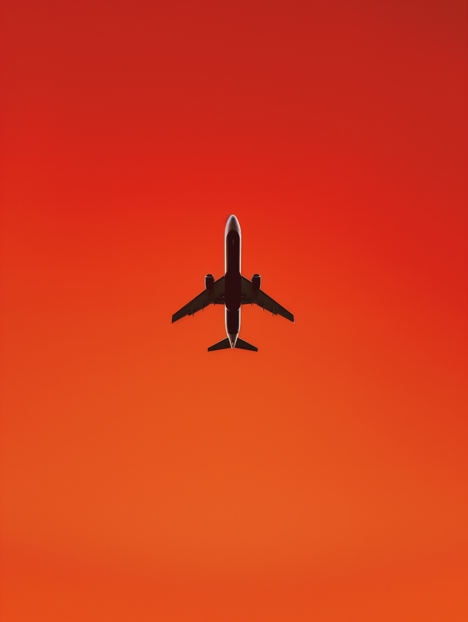 Airplane in Fiery Sky