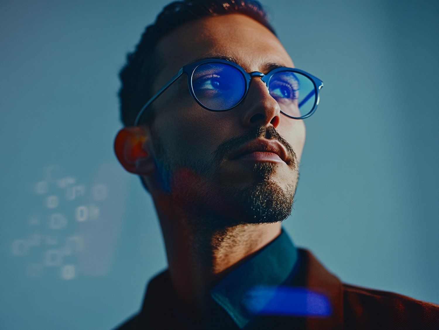 Contemplative Man with Futuristic Glasses