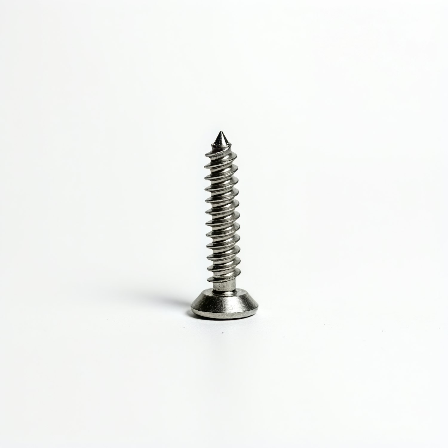 Metallic Screw Against Light Background