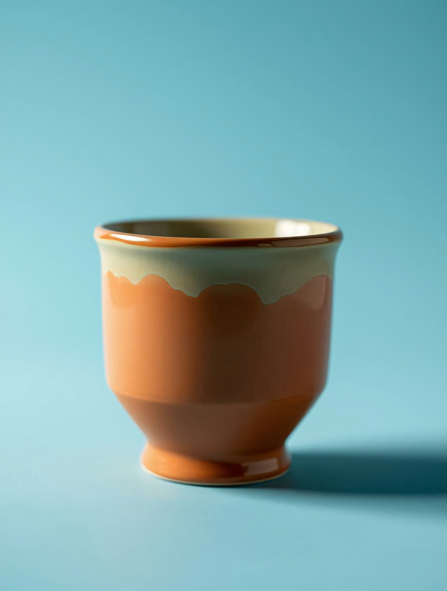 Ceramic Cup on Light Blue Background