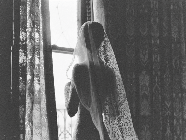 Contemplative Woman by the Window