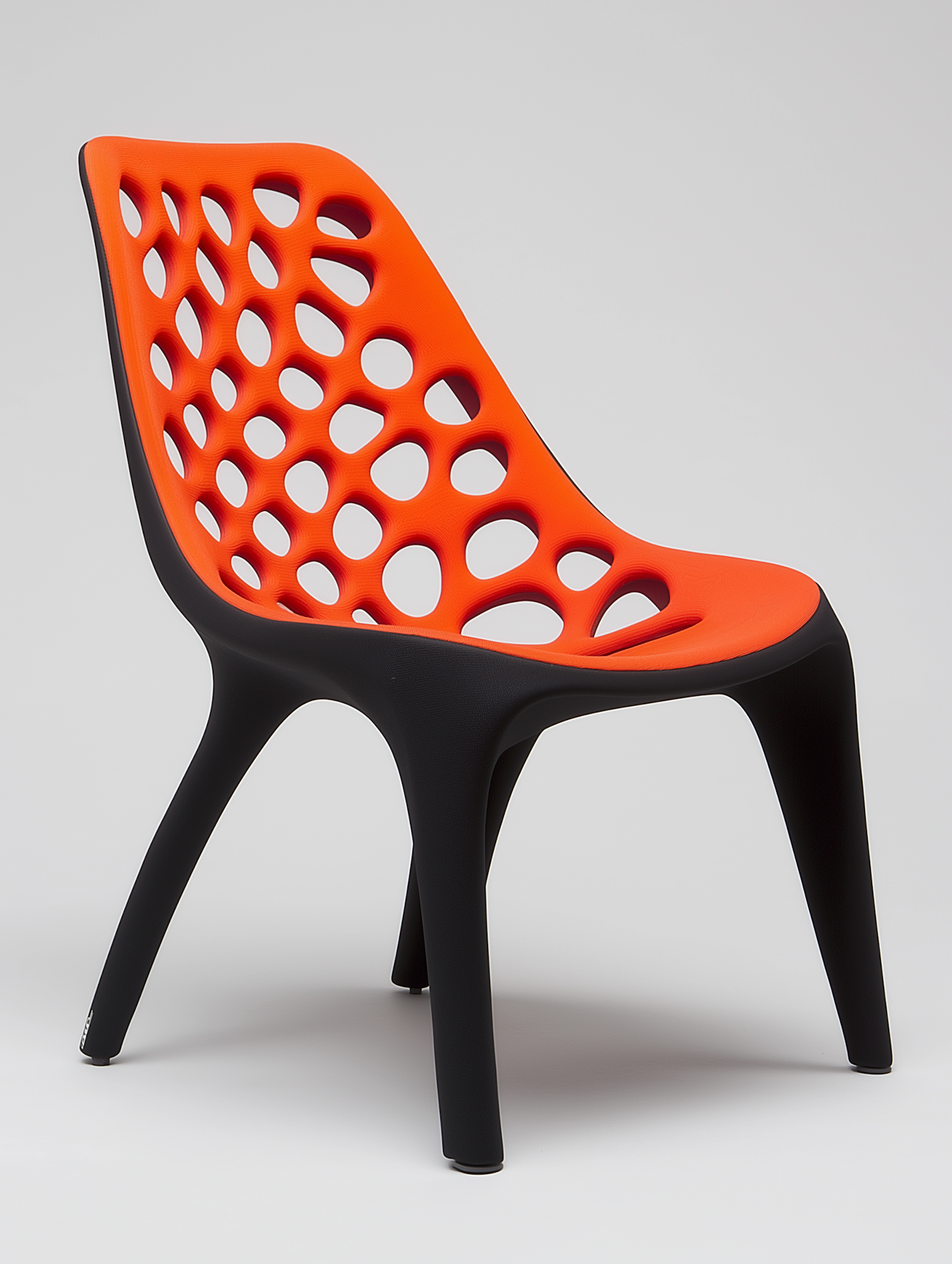 Modern Orange Chair with Circular Perforations