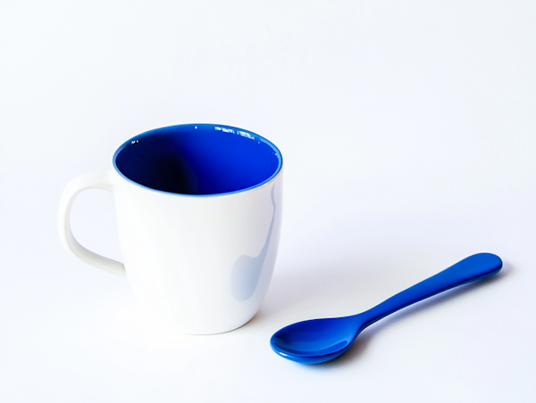 Minimalist Blue and White Mug with Spoon