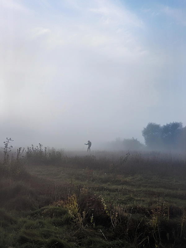 Ethereal Foggy Landscape with Solitary Figure