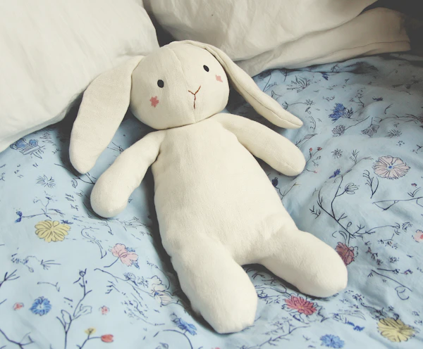 Stuffed Bunny on Bed