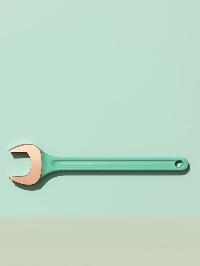 Pastel Wrench on Mint Green Background