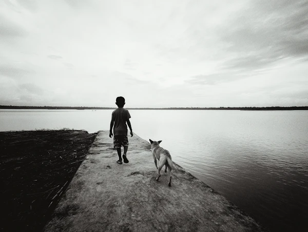 Boy and Dog on Pier