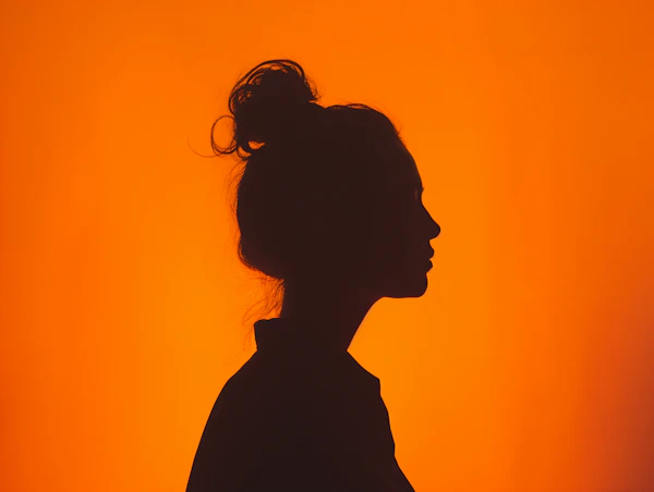 Silhouette Muse in Amber Glow