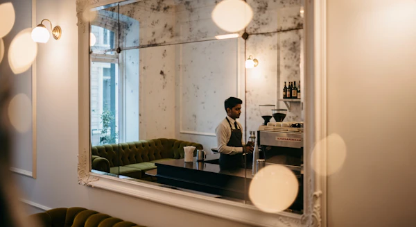 Barista in Cozy Cafe