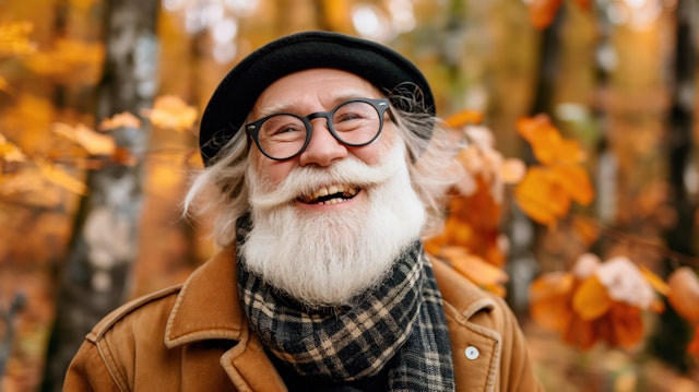 Cheerful Elderly Man in Autumn