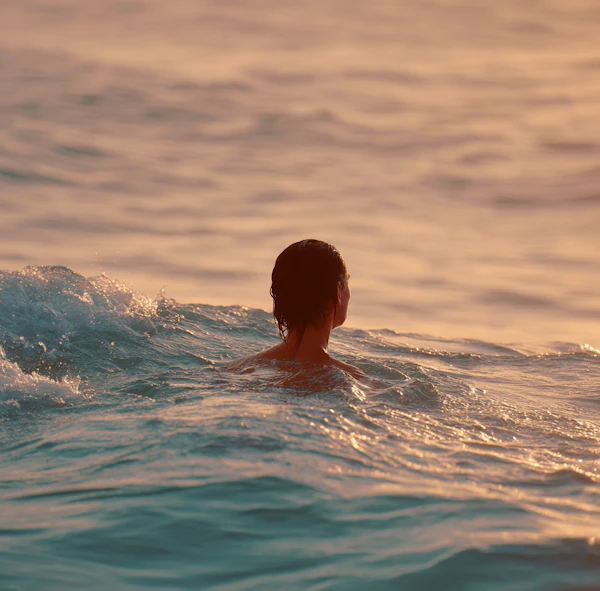 Sunset Ocean Swimmer