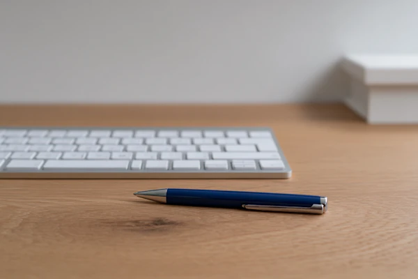 Desk with Pen and Keyboard