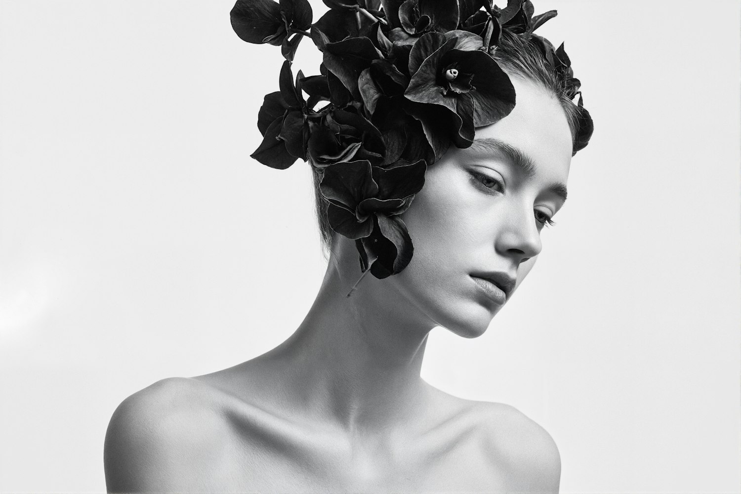 Monochrome Portrait with Floral Adornment