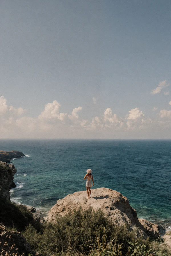 Person on Ocean Cliff