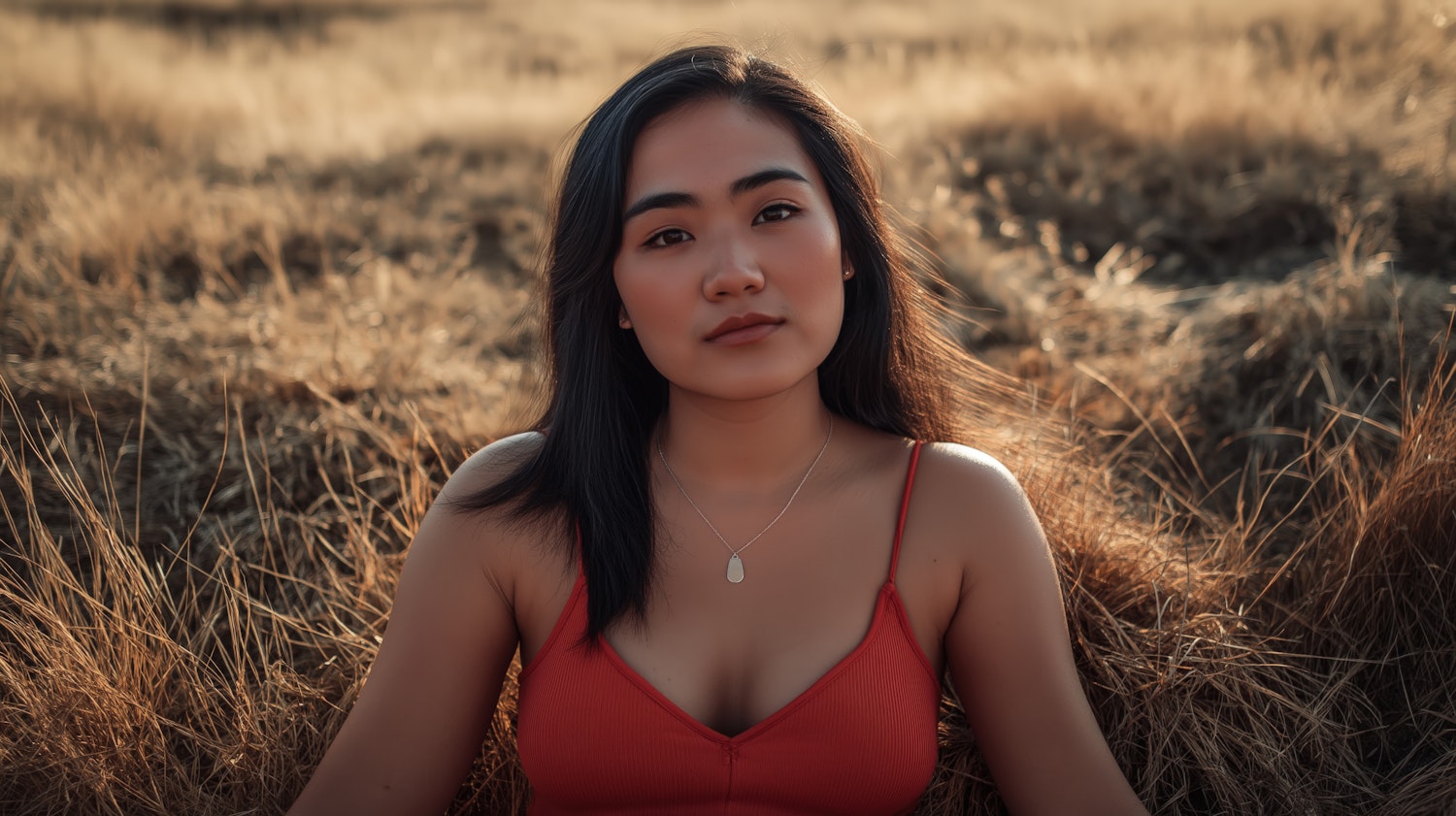 Woman in Field of Tall Grass