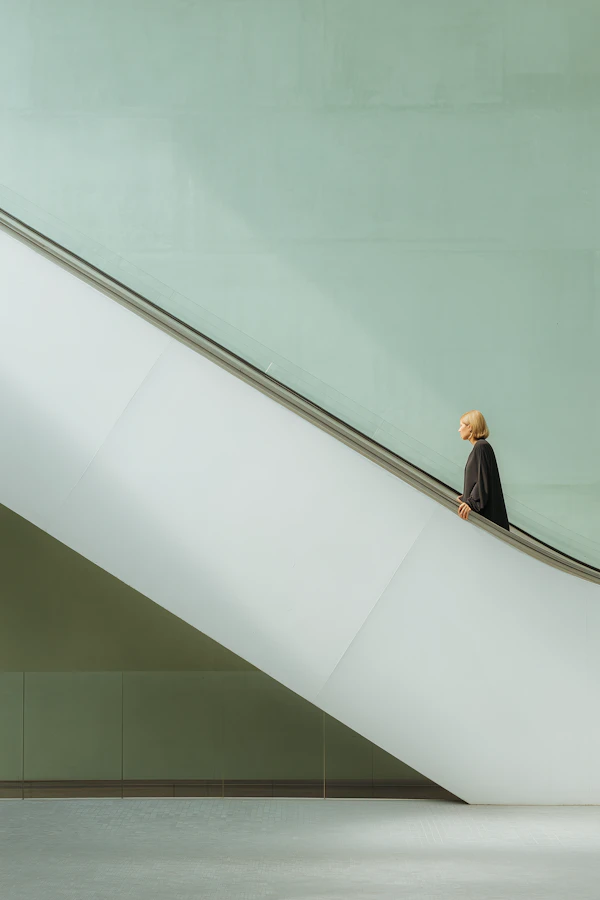 Person on Escalator