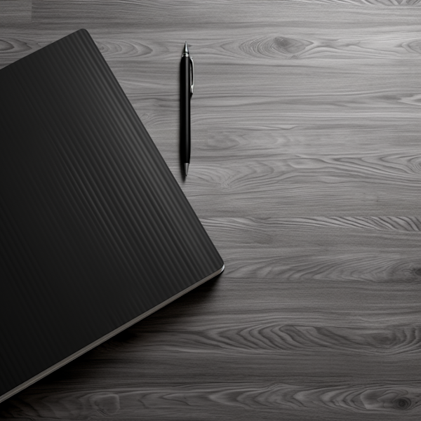 Elegant Black Notebook and Pen on Textured Wood