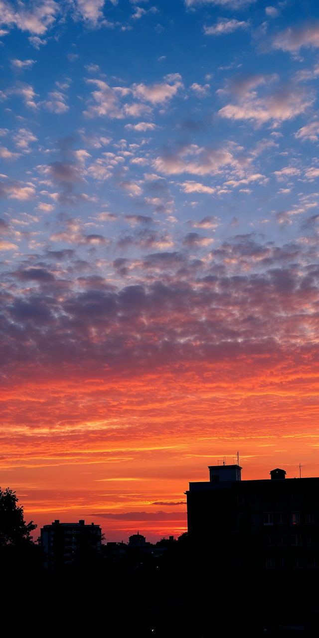 Sunset Over Urban Silhouettes