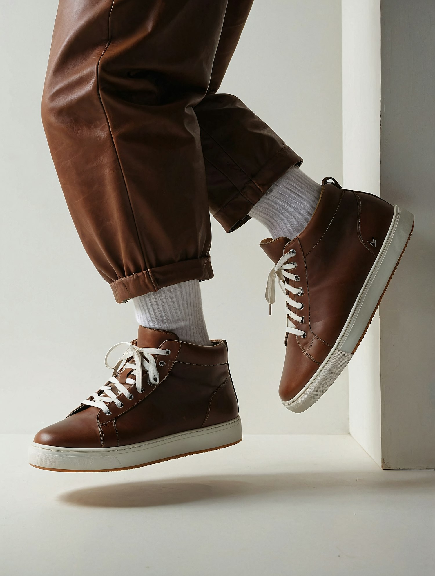 Close-up of Brown Leather High-Top Sneakers