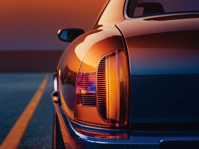 Luxury Car Taillight at Sunset