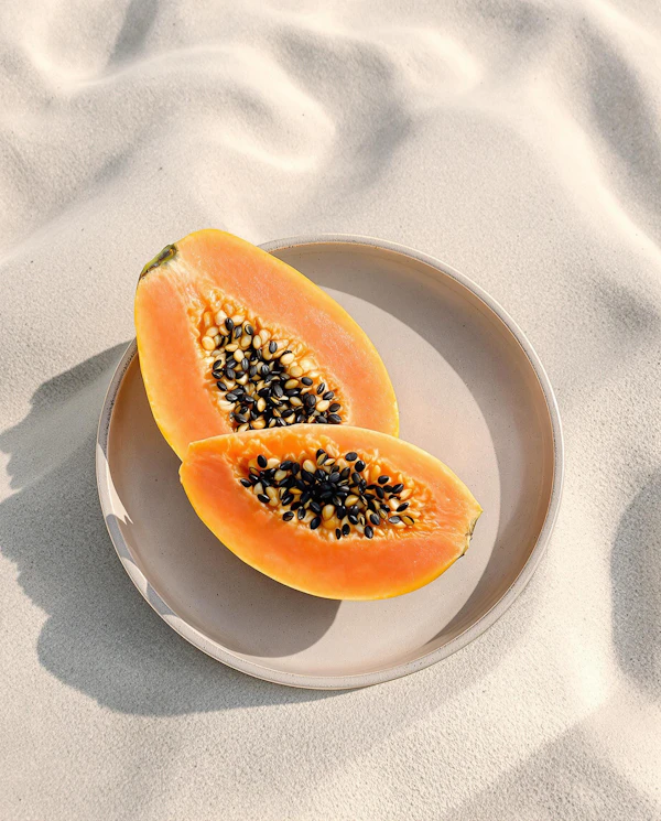 Papaya On Sandy Plate