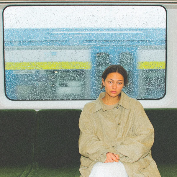 Woman on Train Bench