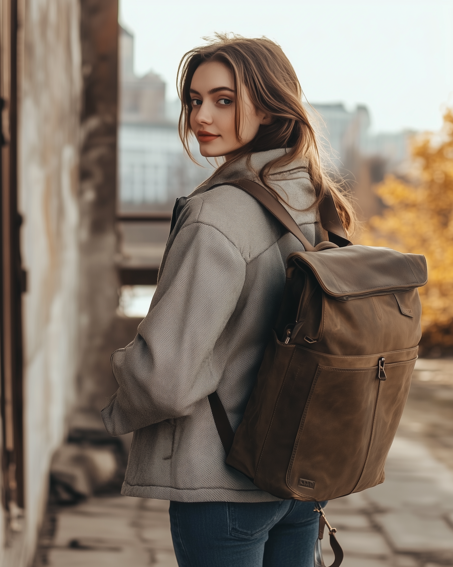 Young Woman with Backpack in Autumn Setting