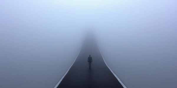 Solitary Figure in Fog