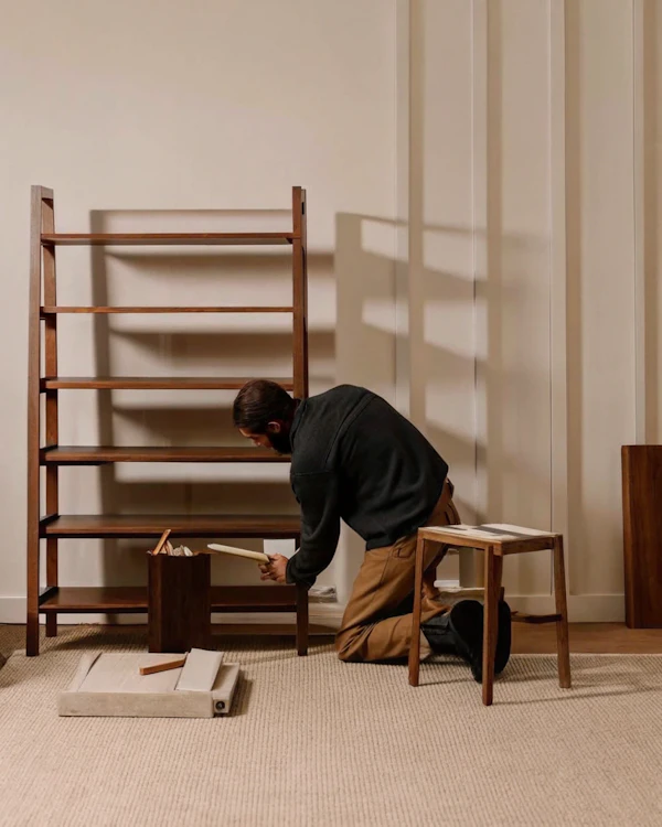 Man Assembling Shelf