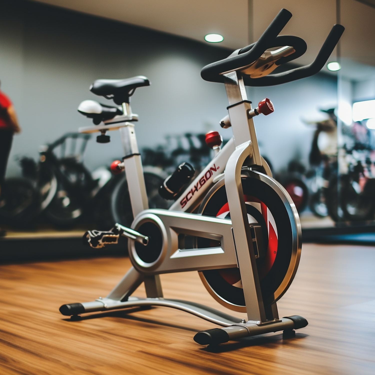 Modern White Stationary Exercise Bike with Red and Black Accents