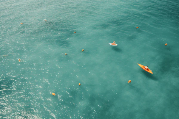 Serene Turquoise Sea with Orange Kayaks