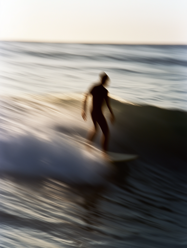 Surfer Riding a Wave