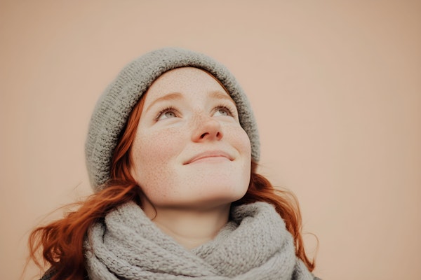 Contemplative Young Woman in Warm Attire